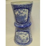 A 19th Century Chinese pottery tapered vase with blue and white landscape decorated panels,