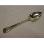A George III silver "Old English" pattern dessert spoon with beaded edge,