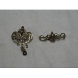 A 9ct gold bar brooch set amethyst and seed pearls and a similar Art Nouveau-style pendant set