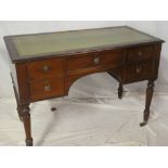 A Victorian mahogany rectangular writing desk with inset leather writing surface,