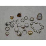 A selection of various dress rings including silver dress rings, bracelet, pendant necklace,