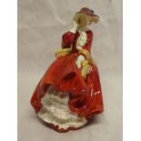 A Royal Doulton china female figure "Top'O the Hill" signed by Leslie Harradine HN1834