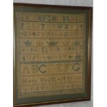An early Victorian needlework rectangular sampler depicting alphabet and letters by Mary Heath 1841,