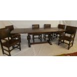 A good quality oak rectangular draw leaf refectory-style dining table on bulbous tapered legs,