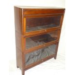 A Globe Wernicke-style mahogany three tier stacking bookcase with sliding glazed fronts,