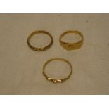 A small 9ct gold signet-style ring and two various 9ct gold circular bands (3)