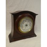 An Edwardian aneroid barometer with china circular dial in brass mounted mahogany tapered case