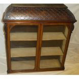 A late Victorian mahogany display cabinet top with shelves enclosed by two glazed doors surmounted