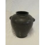 A late 19th Century Japanese bronze tapered two-handled vase, signed,