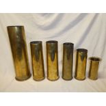 Two First War trench art brass shell cases,