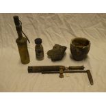 A Cornish mining smelting crucible, brass blow pipe apparatus,