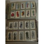 Two albums containing sets and part sets of mainly transport cigarette cards including Lambert &