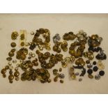 A large selection of various military and other tunic buttons including Queen's West Surrey