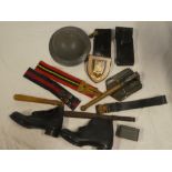 A selection of various military items including 1964 entrenching shovel, two various truncheons,