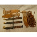 Three unissued jungle survival knives with sheaths,