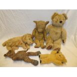 Four various old plush covered teddy bears and a plush covered dog (5)