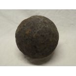 A large 19th century iron cannon ball, found off Penzance,