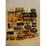 A selection of boxed and unboxed diecast vehicles including Corgi 1955 MG,