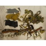 A selection of WWII and later webbing straps and equipment including 1943 helve cover, spurs,