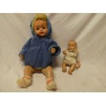 A small Rosebud child's baby doll and one other composition doll (2)