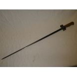 A French M1886 Lebel bayonet with brass hilt and cruciform blade