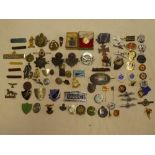 Various enamel badges, military cap badges,