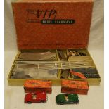 A VIP electronic model roadways set with two boxed cars and track in original box
