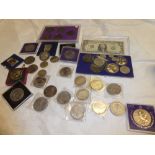 A selection of various coins including three Canadian silver dollars - 1965/66;