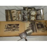 An album containing a selection of 19th Century and later photographs - scenic views, Foreign views,