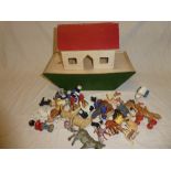 A painted wood Noah's Ark containing a selection of miscellaneous animals 14" long