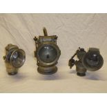 Three various carbide motoring lamps including Lucas "King of the Road" carbide lamp,