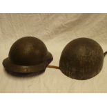 A British military despatch rider's helmet with leather mounts and a Continental steel helmet (2)
