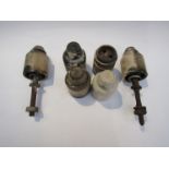 Six telegraph insulators, one marked LMS,