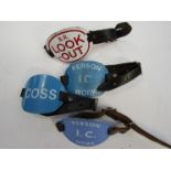 Four enamel arm bands marked B.R. Lookout, Coss, and two Person I.C.