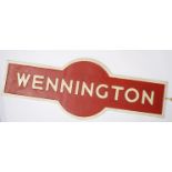 A cast alloy station target sign - WENNINGTON,