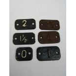 Six cast iron railway cant markers for curves, 0, 1, 1½, 2, 4,