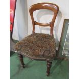 A Victorian mahogany LNER station master's/clerks desk chair with overstuffed seat, floral pattern,