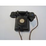 A black bakelite telephone labelled New Hall Up Loop/ South Points