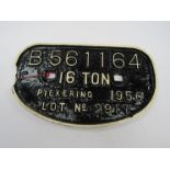 A cast iron PICKERING wagon plate B.561164 1956 Lot no.