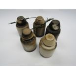 Five LNER insulators, some with wires attached