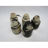 Five LMS insulators, one with wire attached,