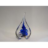 A blue and clear glass tear drop design piece of art sculpture, 15cm tall,