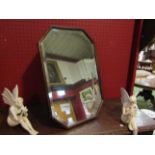 A bevel edged canted corner easel back/wall hanging mirror,