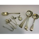 Mixed silver and plated flatware including sugar nips, teaspoons,