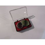 A cased 30x jeweller's loupe
