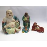 A selection of decorative Oriental figures including Buddha and sage (4), tallest 30cm,