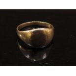 A gold signet ring, stamped 9ct, 4.