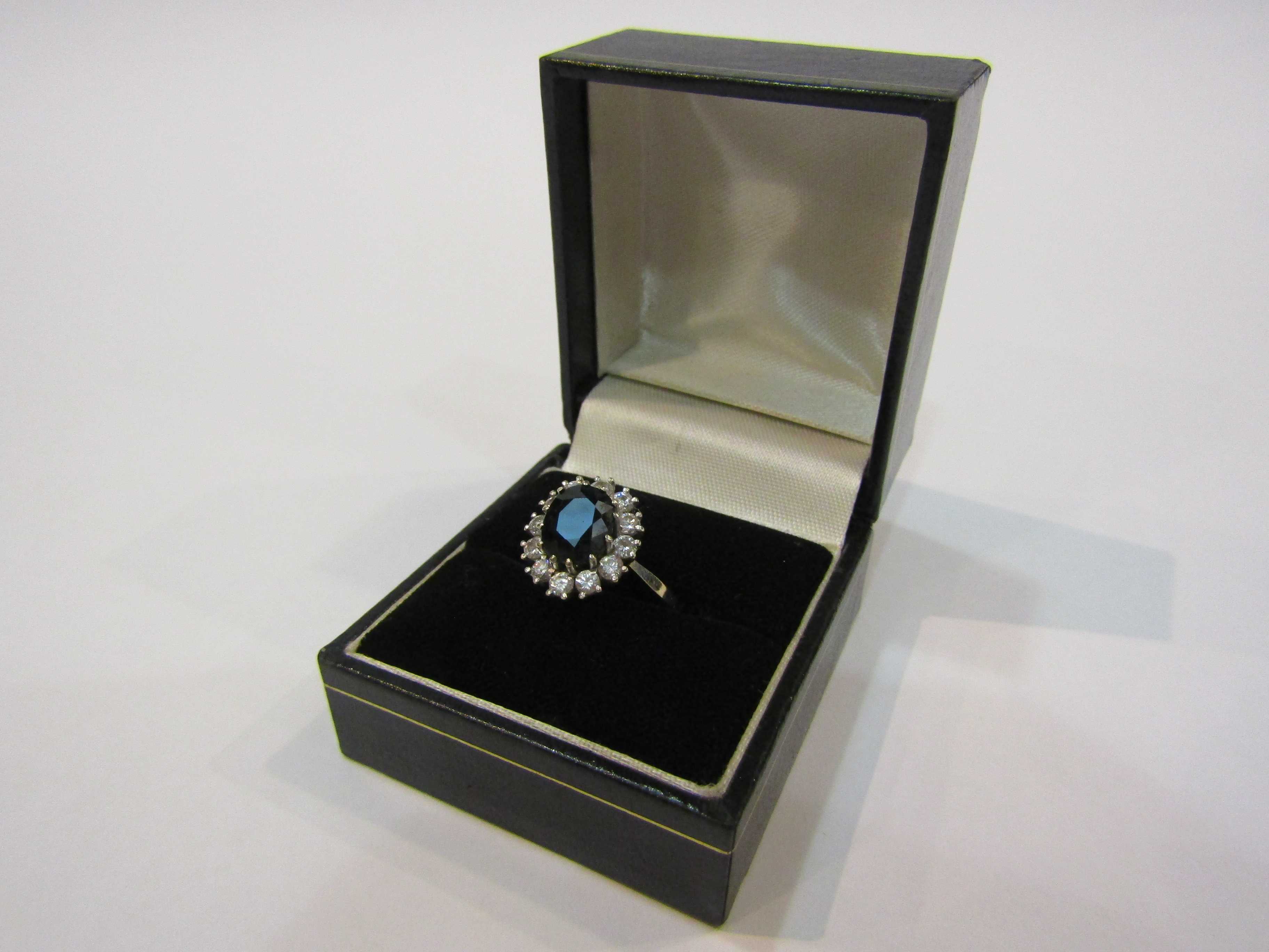 A 9ct sapphire and diamond cluster ring - Image 4 of 4