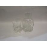 A cut glass water decanter with matching tumbler (2)