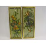 A pair of decorative coloured prints of fruit and vine,